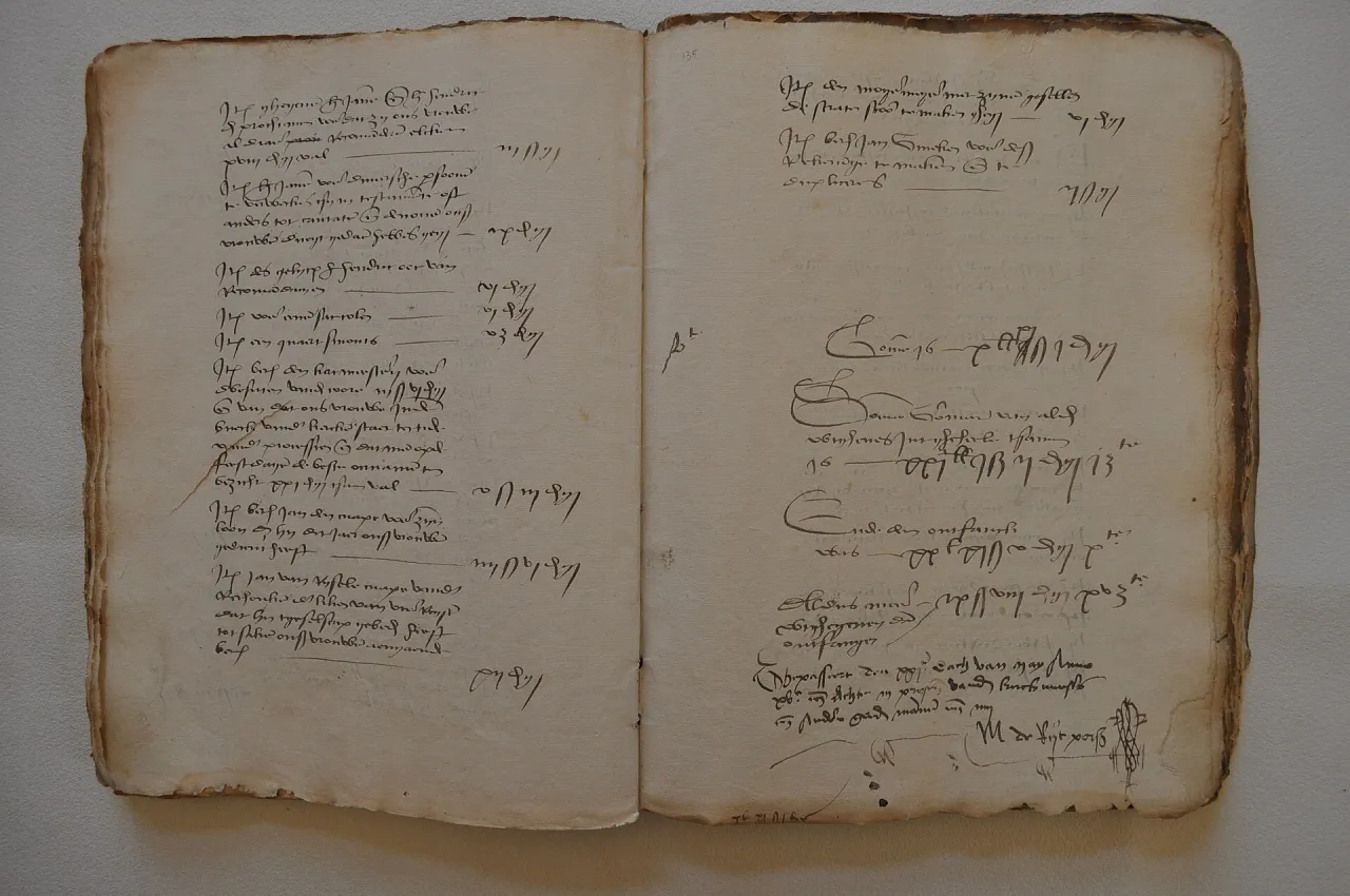Historical account book showing financial record entries