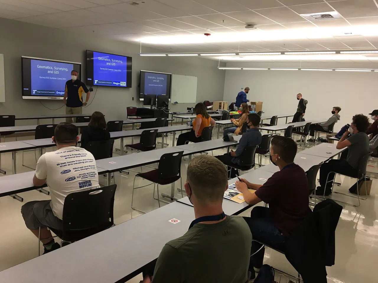 Participants taking part in a classroom discussion