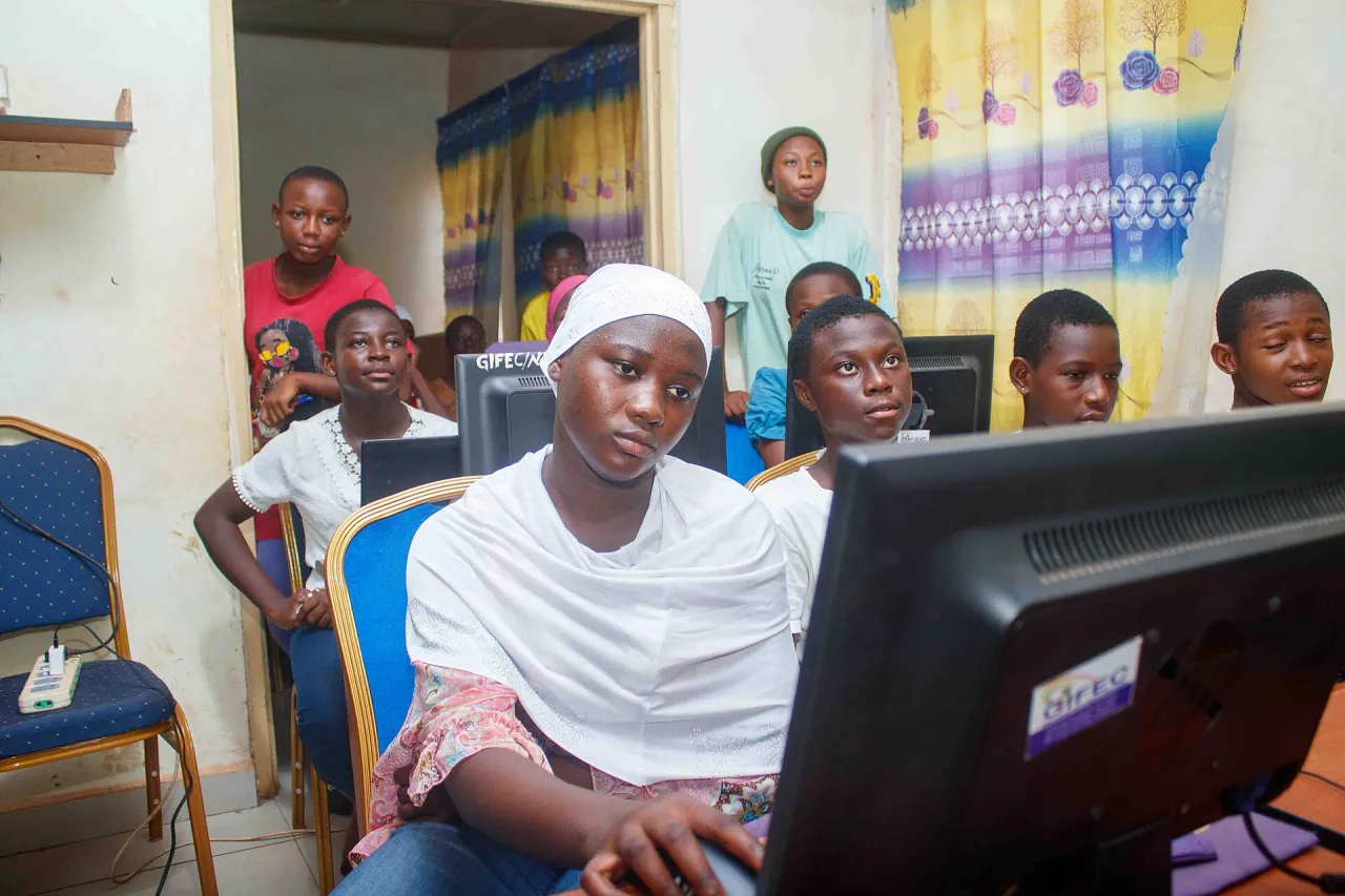 Students at computers during a digital literacy training session