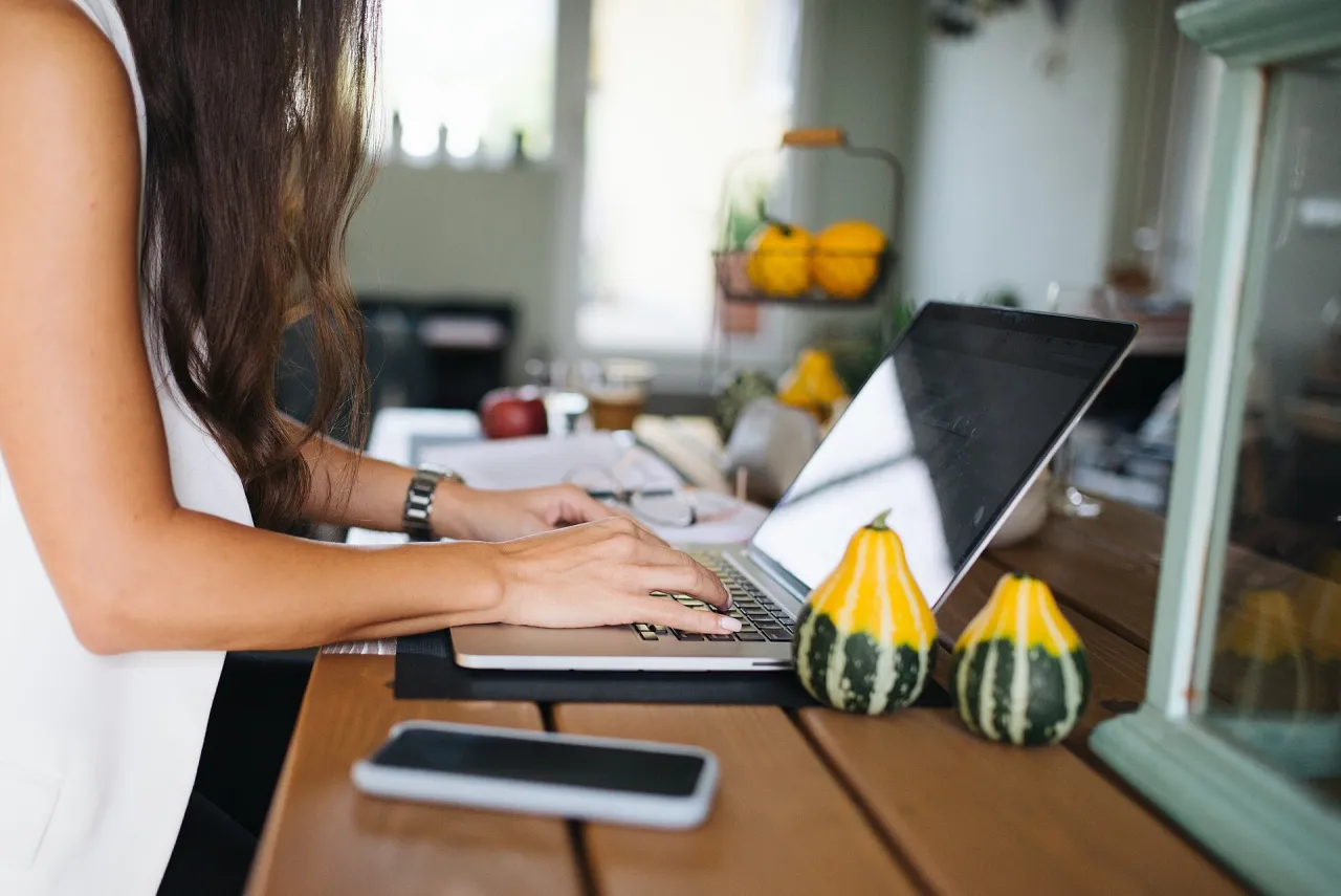 Woman independently reviewing information on a laptop